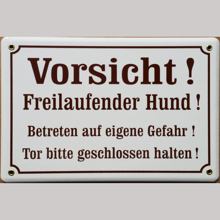 Warnschild „Vorsicht! Freilaufende(r) Hund(e) !“ (Tor